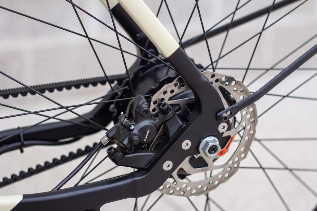 Shimano MT200 hydraulic disc brake caliper on the rear of the Auren EV5