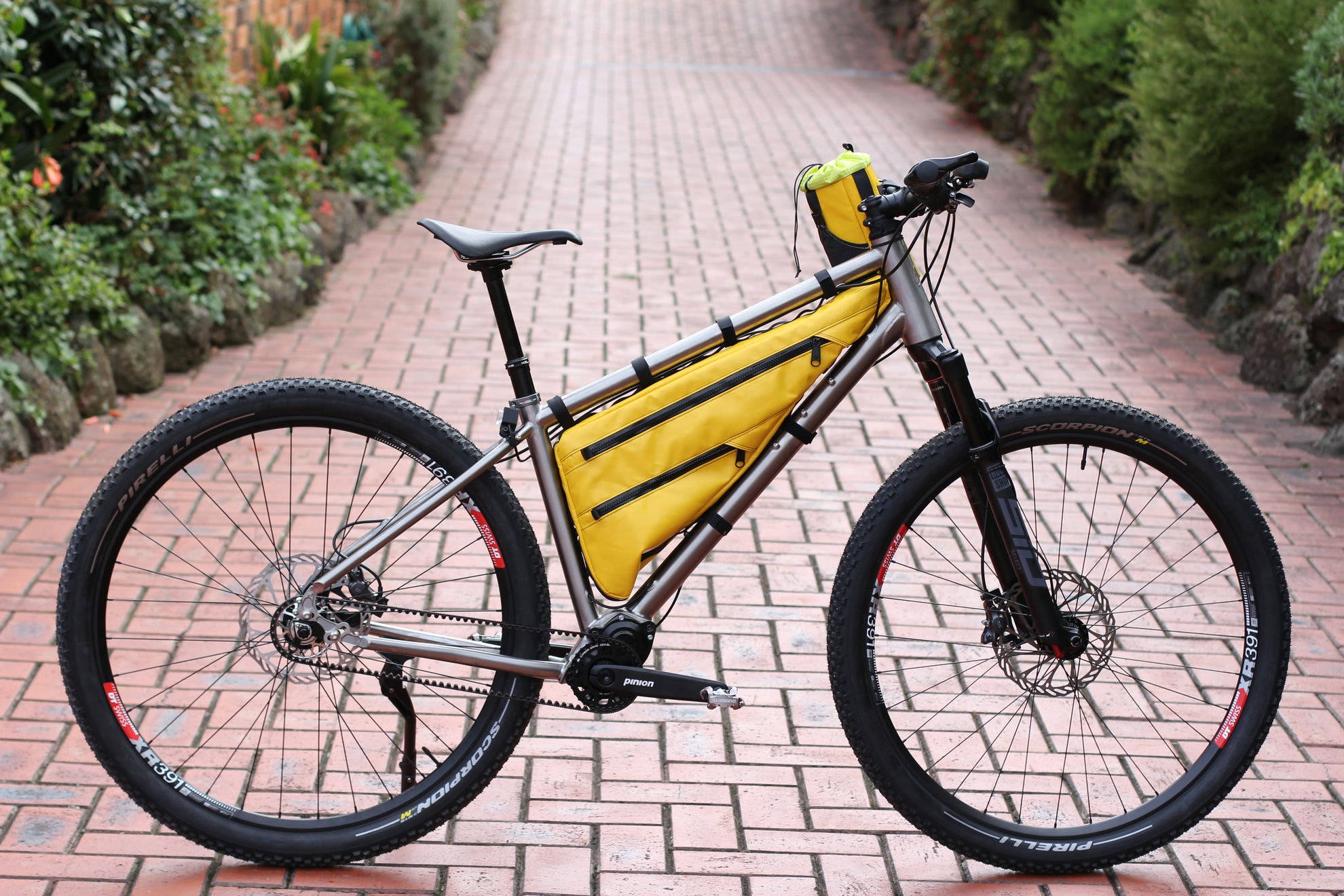 Auren titanium Pinion hardtail with a full frame bag